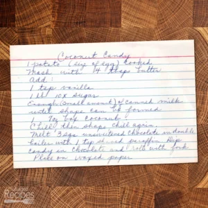 Recipe card with handwritten recipe for coconut candy