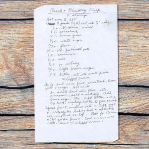 Handwritten recipe for peach and blueberry crisp