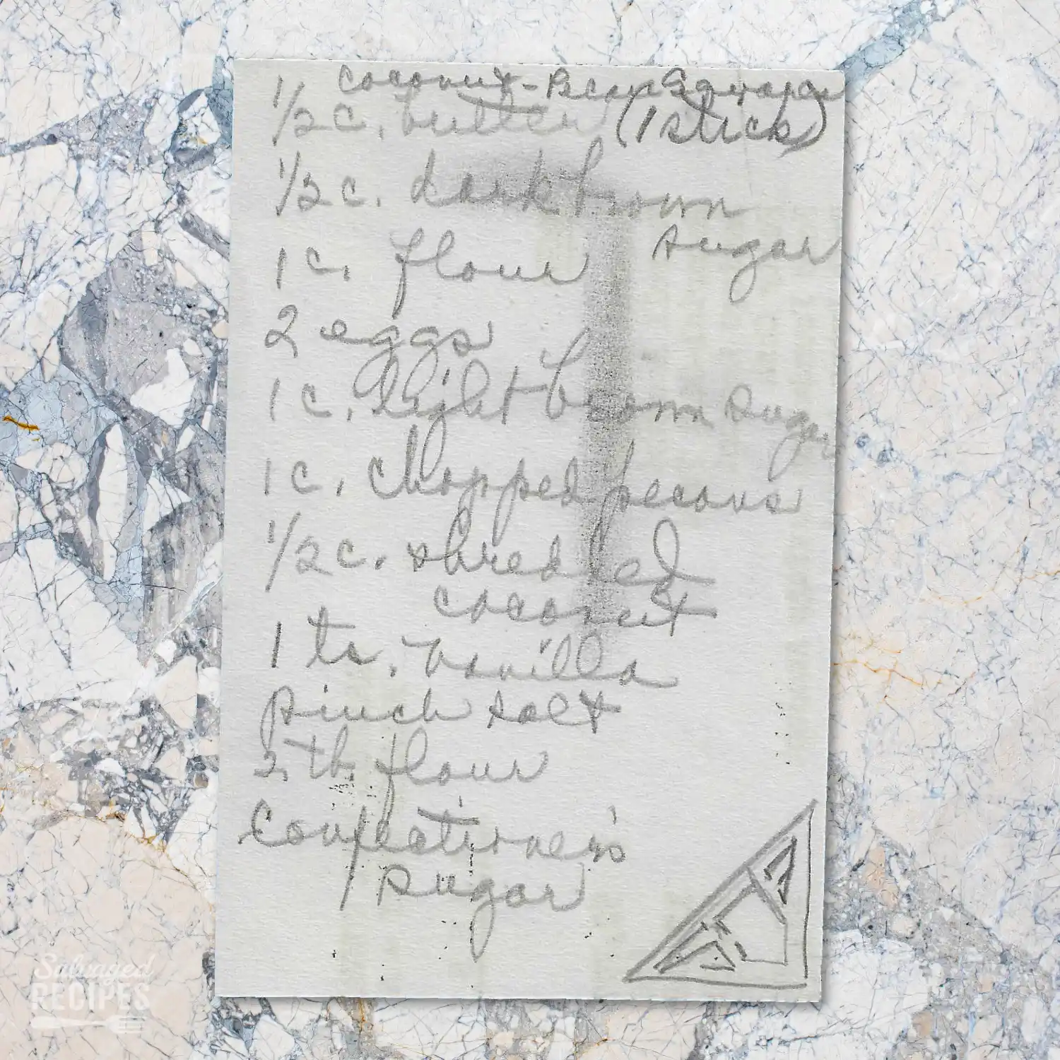 Handwritten recipe for Coconut Pecan Squares